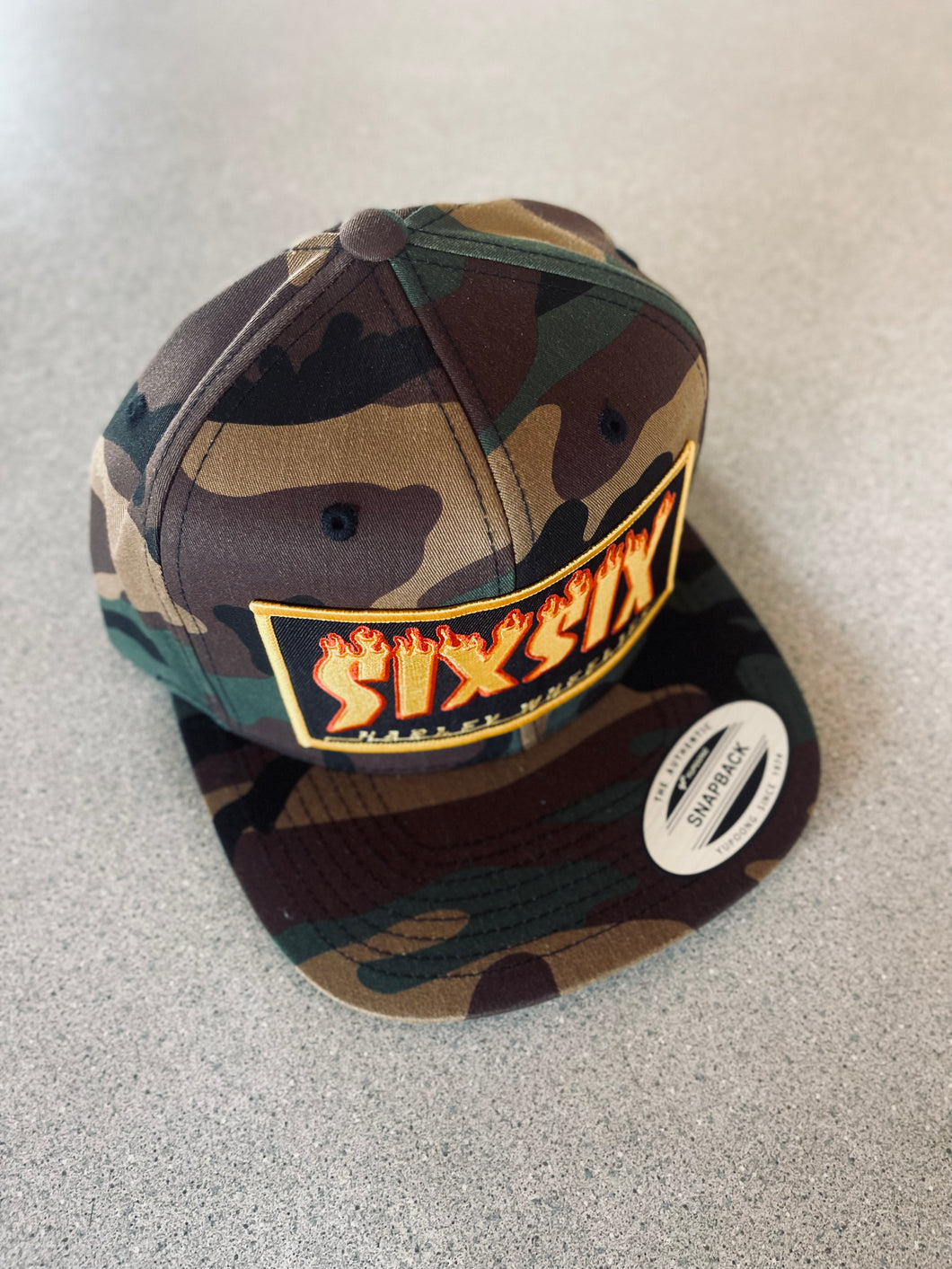 UP IN FLAMES CAMO SNAP BACK